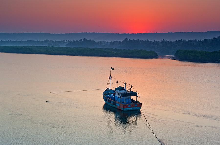 Sunrise over Chapora river in Siolim Sunrise over Chapora river in Siolim