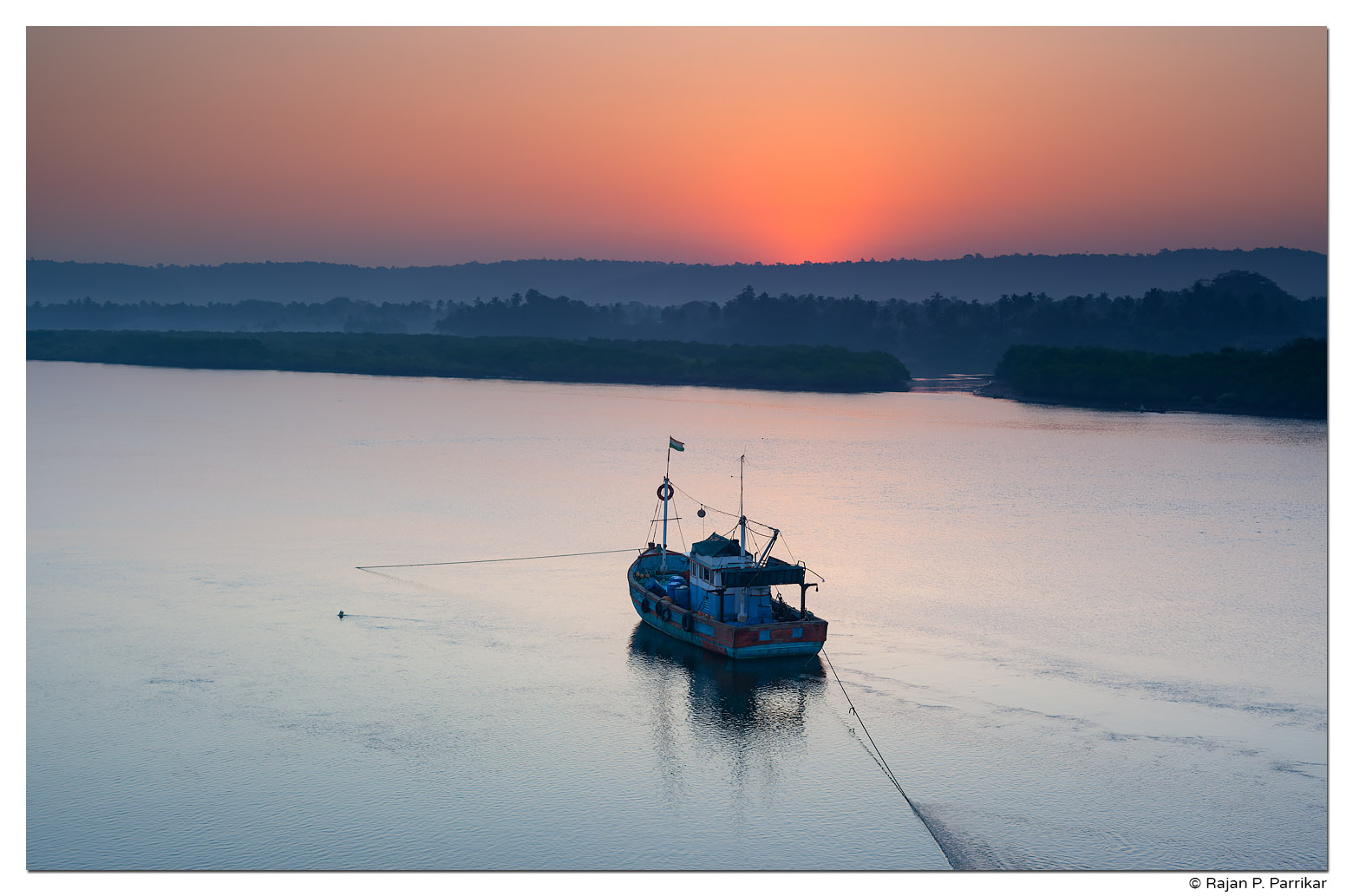 Sunrise in Siolim over Chapora river, Goa