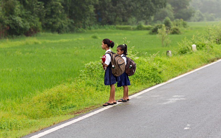 Waiting for the school bus, in Galgibaga, Canacona