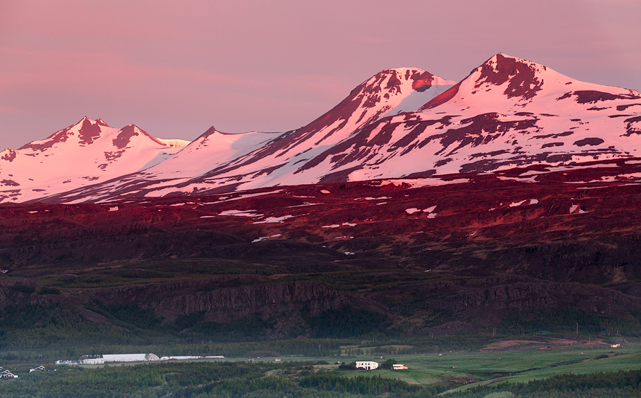The mountains in Akureyri light up