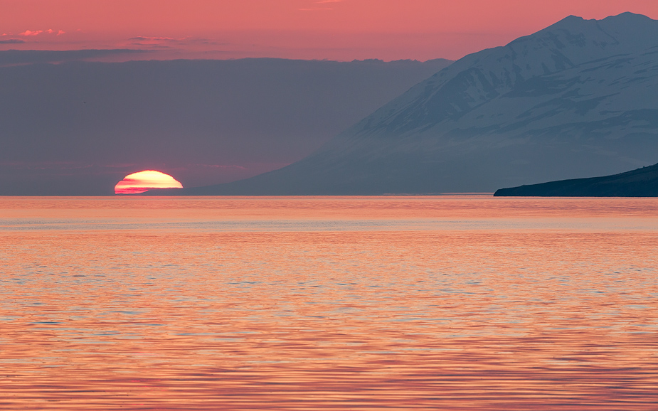 The midnight sun on Eyjafjörður horizon
