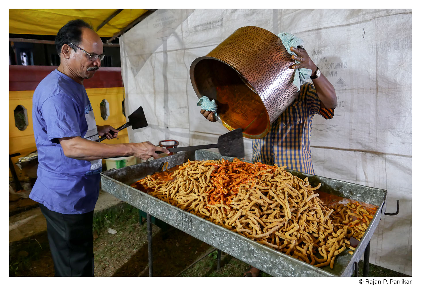 Preparing 'khajem' at Anant Temple, Savoi-Verem, Goa