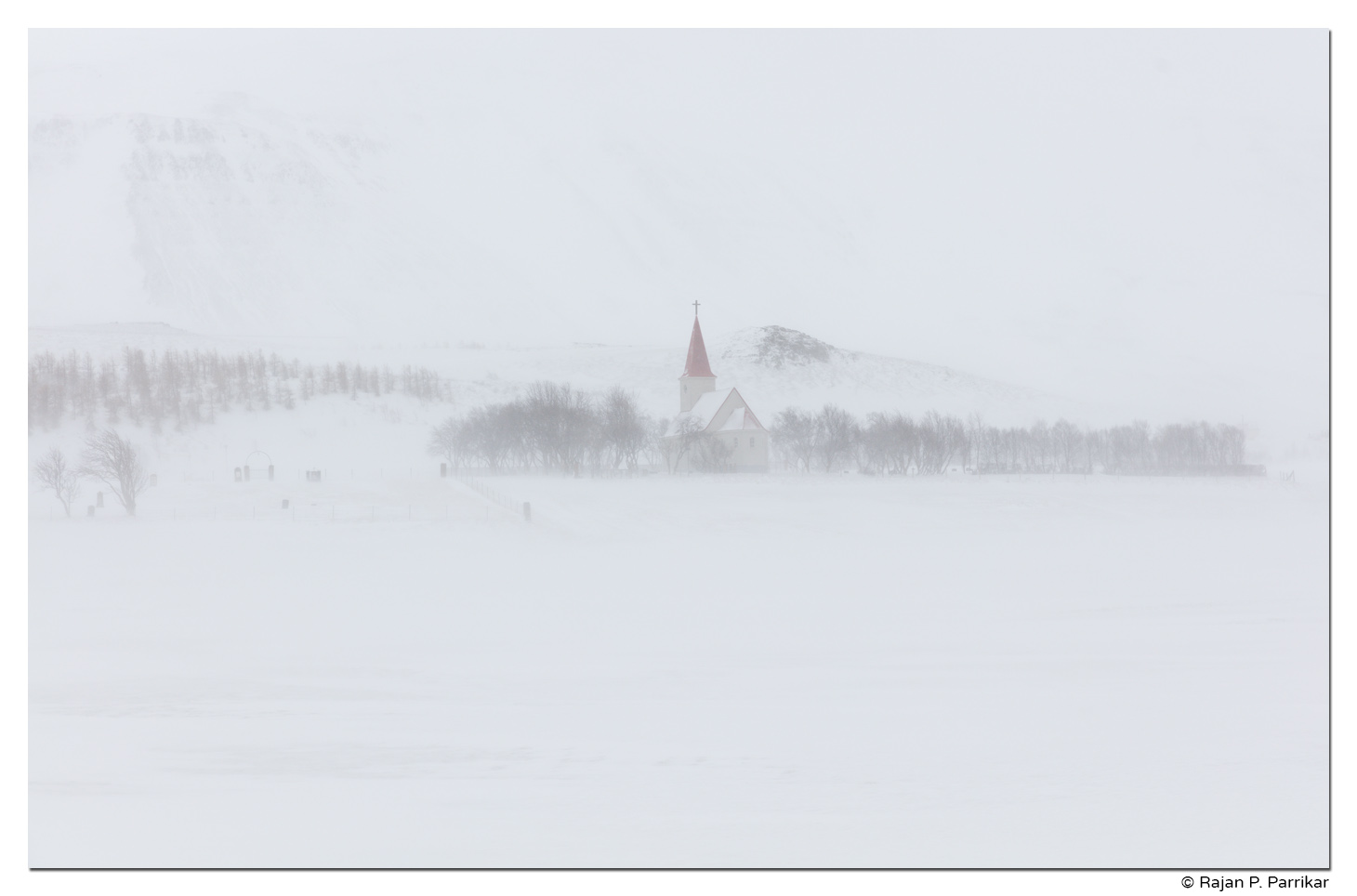 Stærri-Árskógur church in a snow storm, Eyjafjörður, Iceland